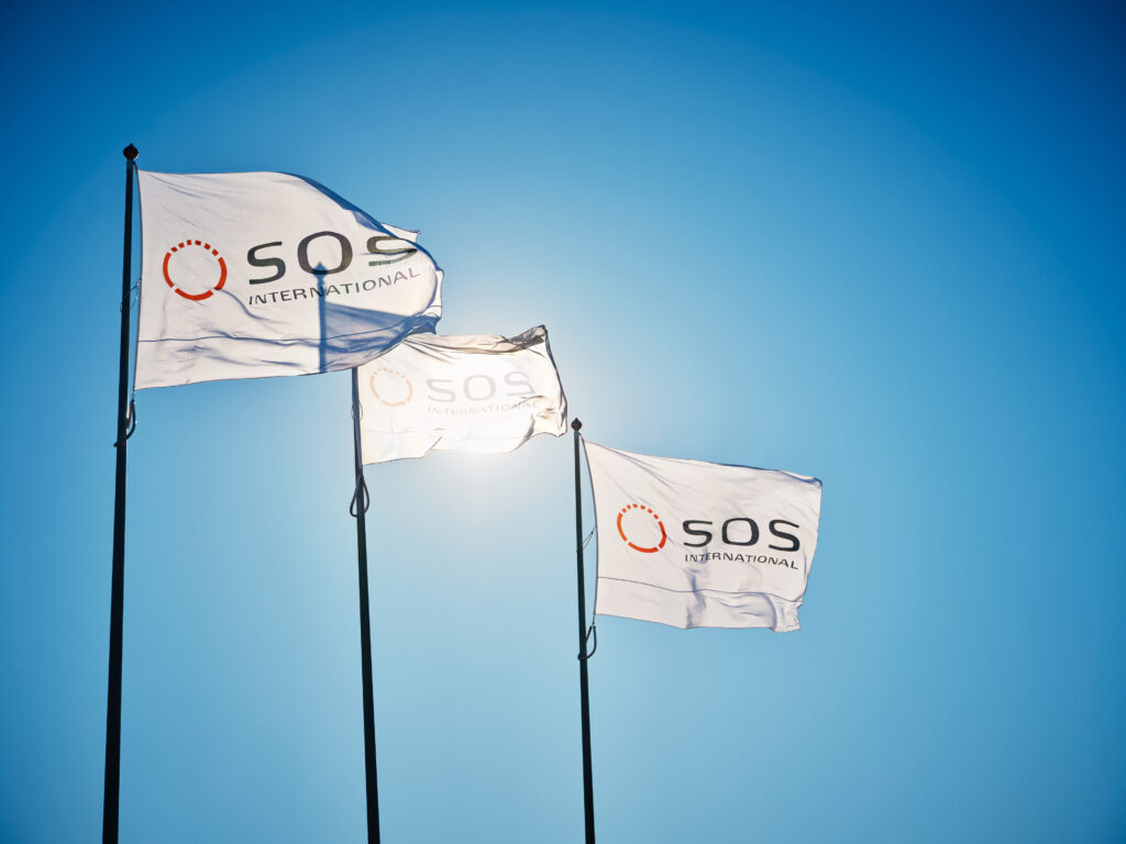 Flags showing the name of SOS International